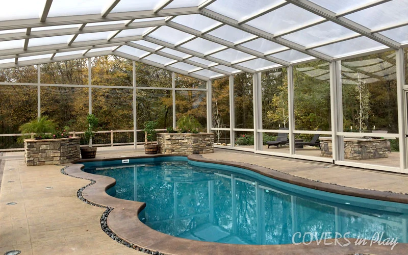 Side angle view of residential pool dome enclosure in Des Moines