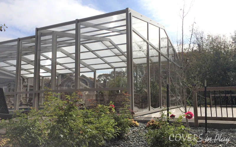 Exterior rear view of pool dome enclosure tracks in Des Moines